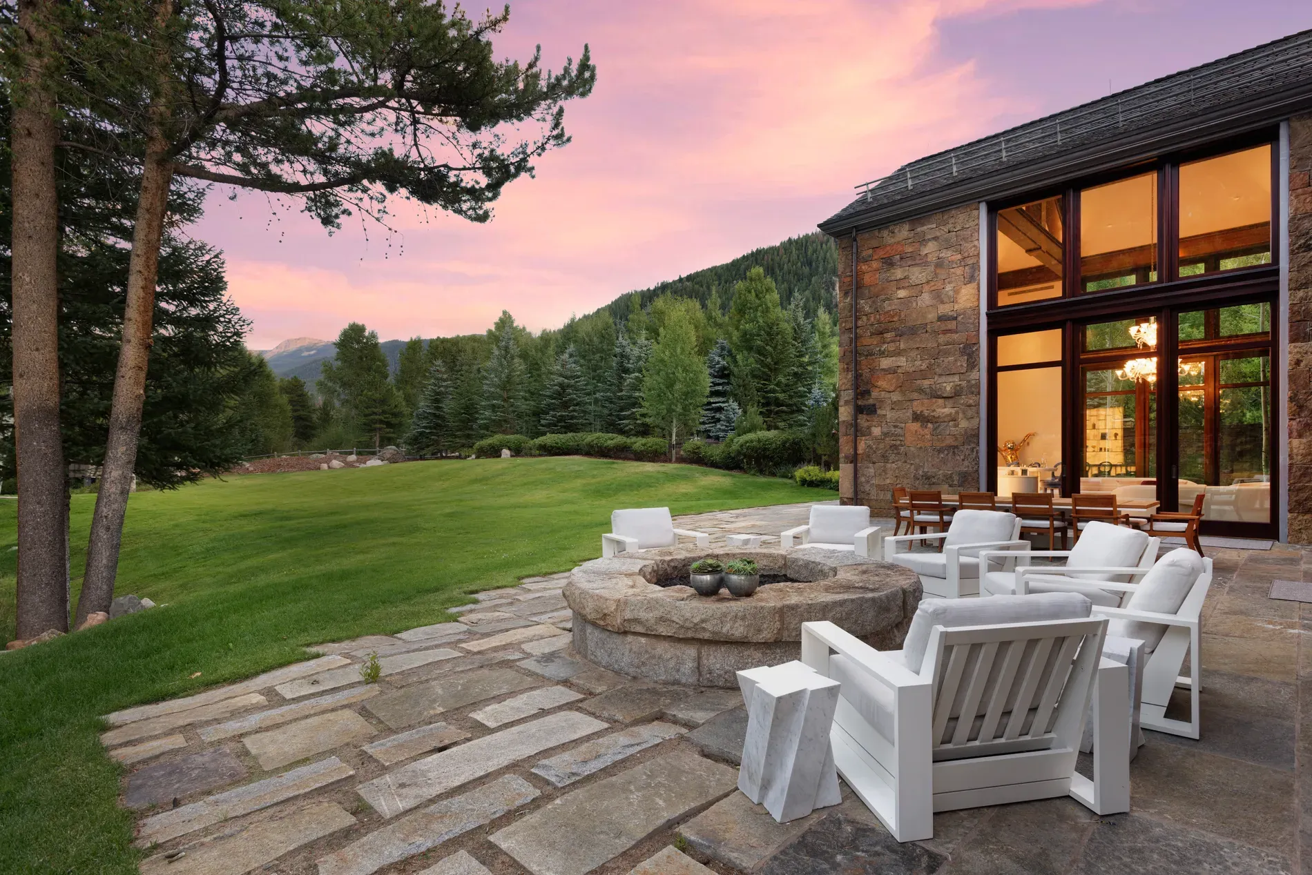 And then the fire pit—stone ring, low chairs. S'mores mandatory.