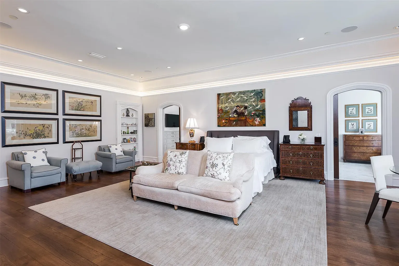 Primary bedroom is serene. Tall ceilings, soft whites, minimal fuss.