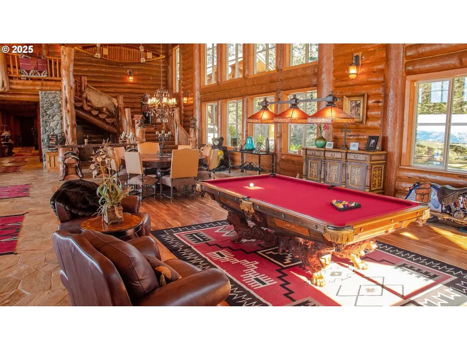 Red felt pool table stealing the scene. Carved legs are doing the most.