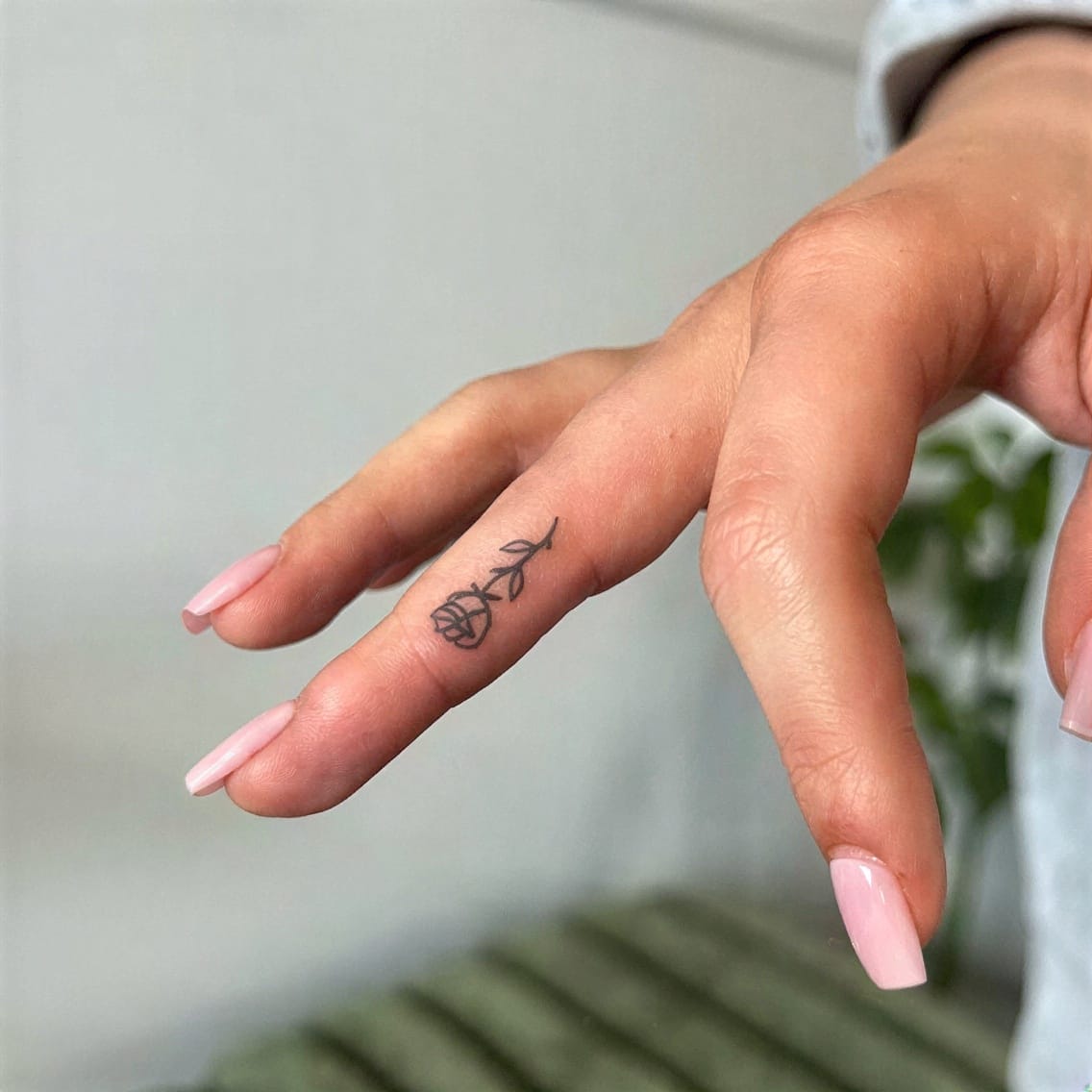 Inner finger initial that reads like a secret code