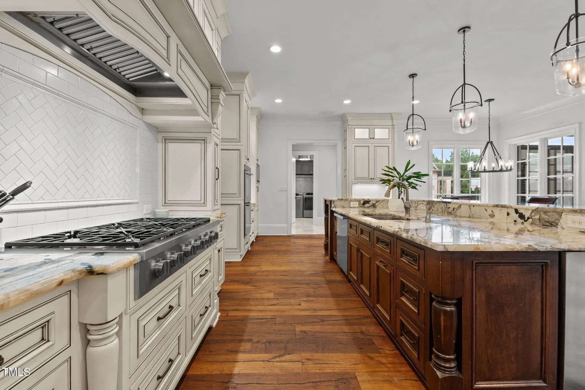 Here’s the fancier kitchen—glass uppers, creamy trim. Feels lighter, more formal.