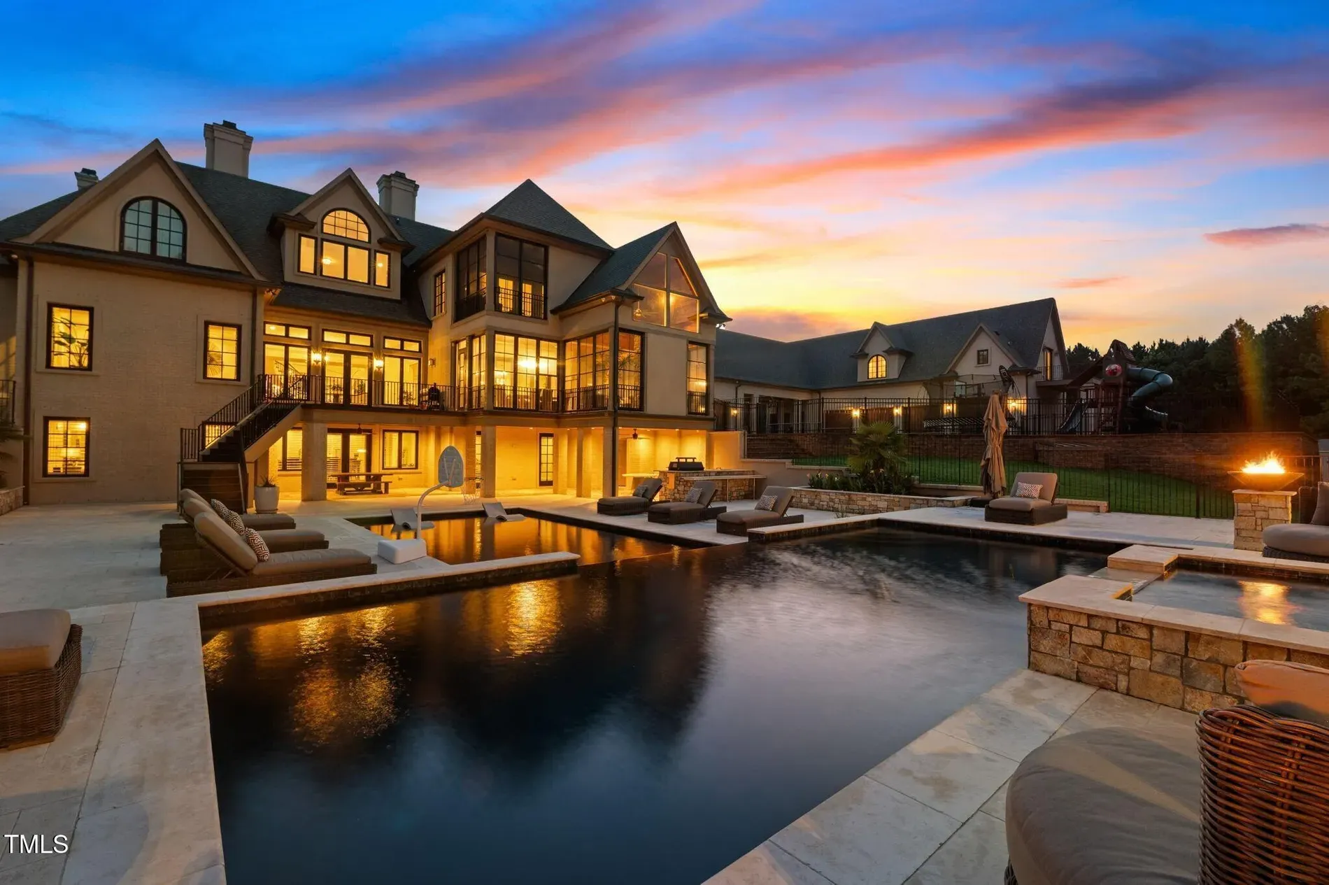 Another angle outside. beige stucco + dark wood. Clean lines, warm, pretty chill.