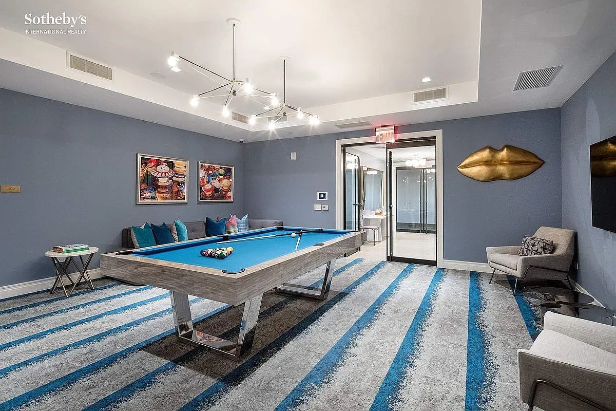 Pool room — from this angle the blue table really pops. Low-key fun.