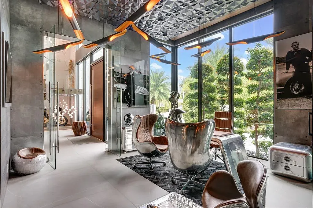 Concrete walls, massive glass. Feels a startup retreat with an actual view.