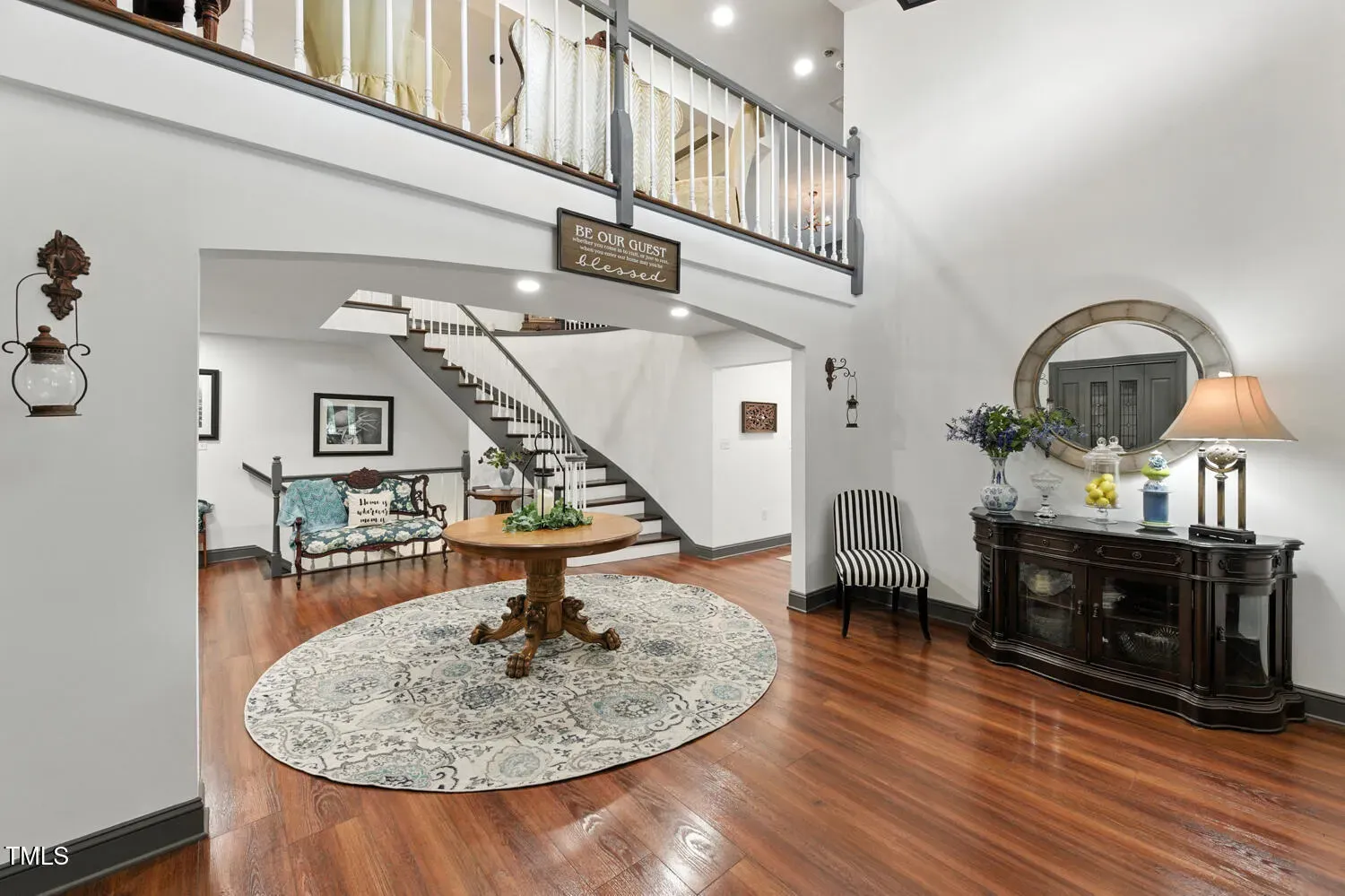 Here’s the foyer — dark floors, light walls. Feels balanced, maybe a tad staged.