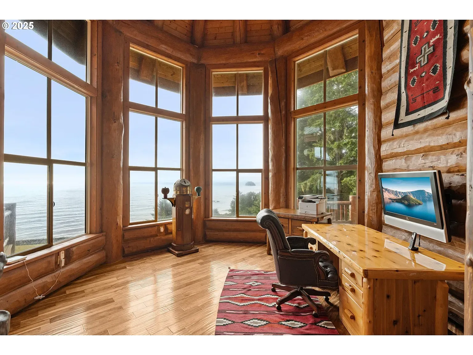 Living area staring straight at the water. Those windows do all the work.