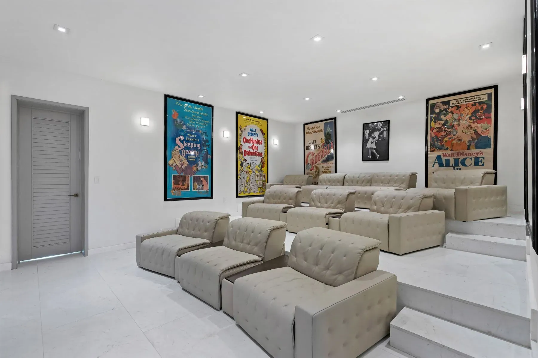 Theater room, beige recliners as far as the eye sees. Popcorn mandatory.