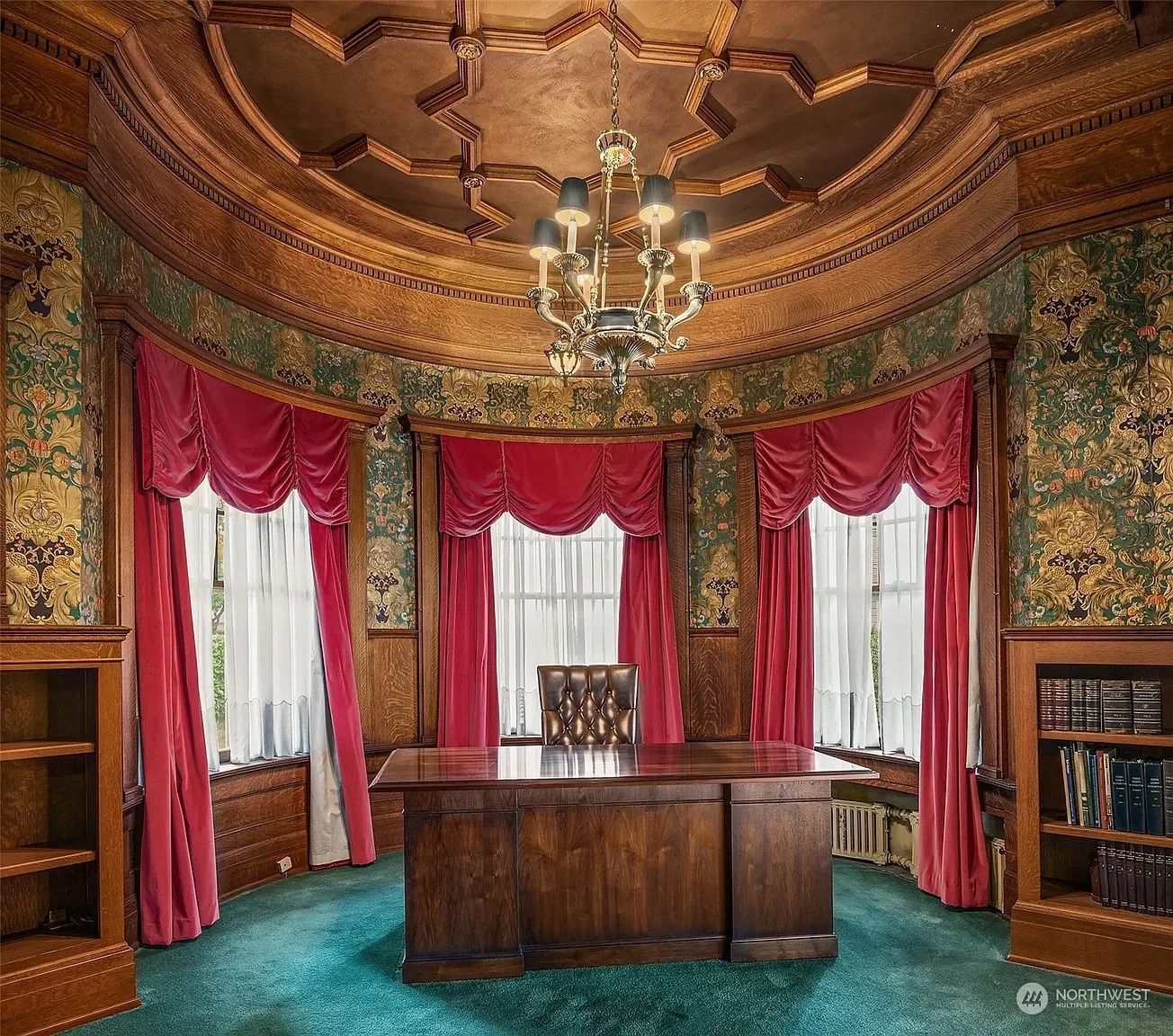 Office goes heavy on the ceiling pattern. Rich tones, very executive energy.