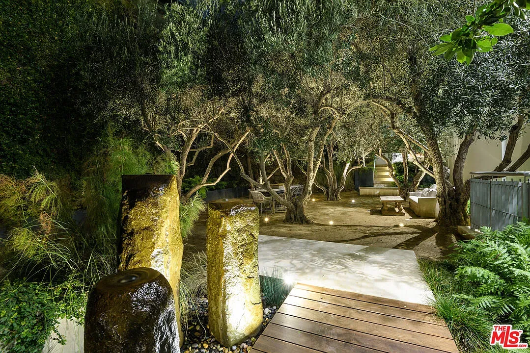 Olive trees and stone path. Feels ancient, in a good way.