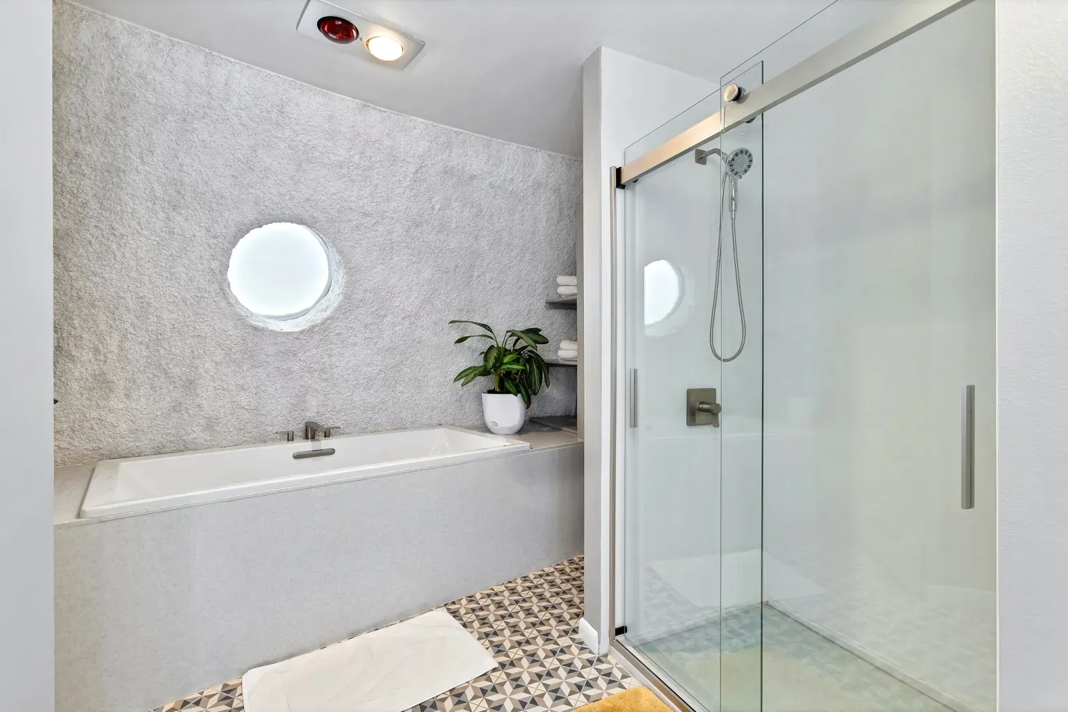 Round window in the bath! Texture everywhere, but still minimal.