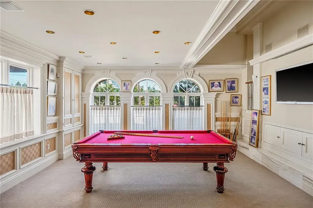 Pink pool table! Bold move. Anyone know why they picked pink?