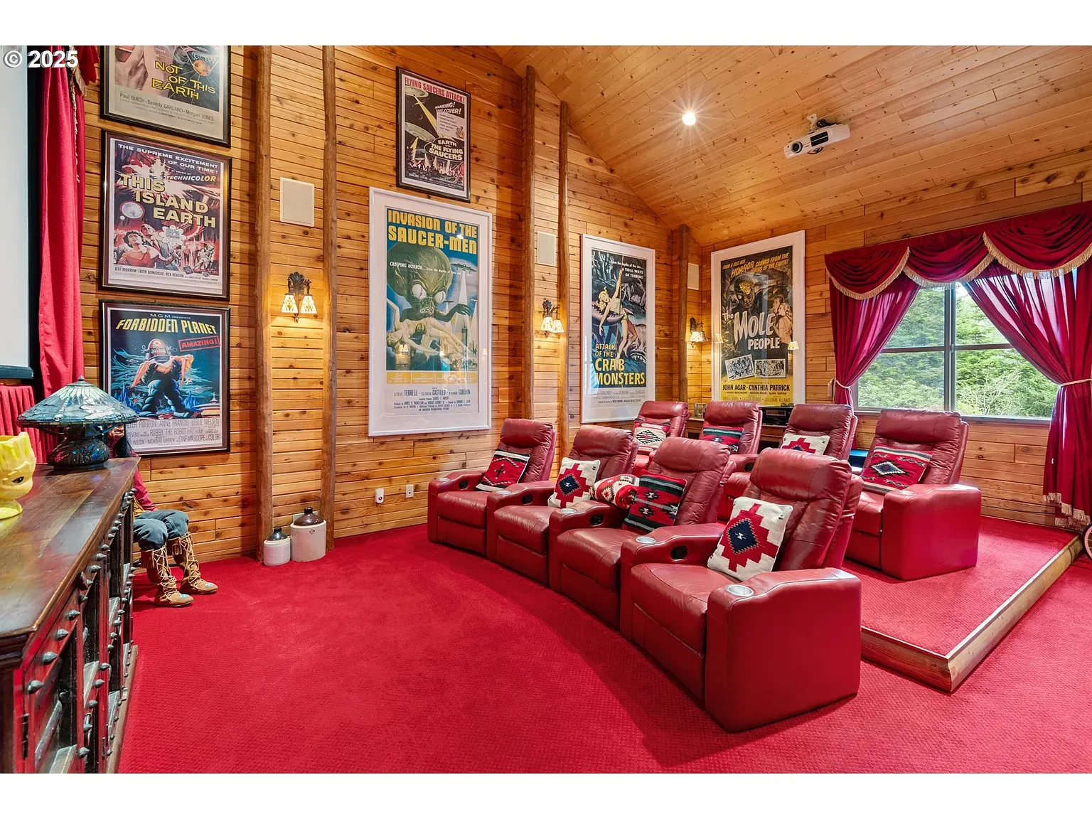 Home theater with vintage posters. I’m absolutely falling asleep here during trailers.