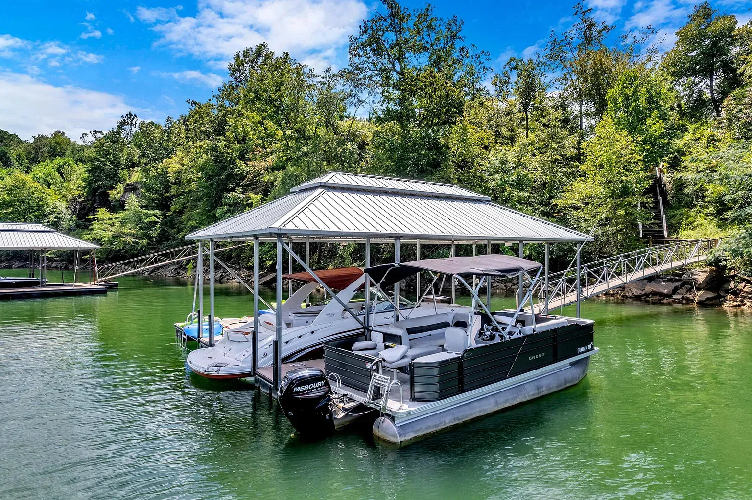 Boat dock under a shiny roof. That water color is unreal.