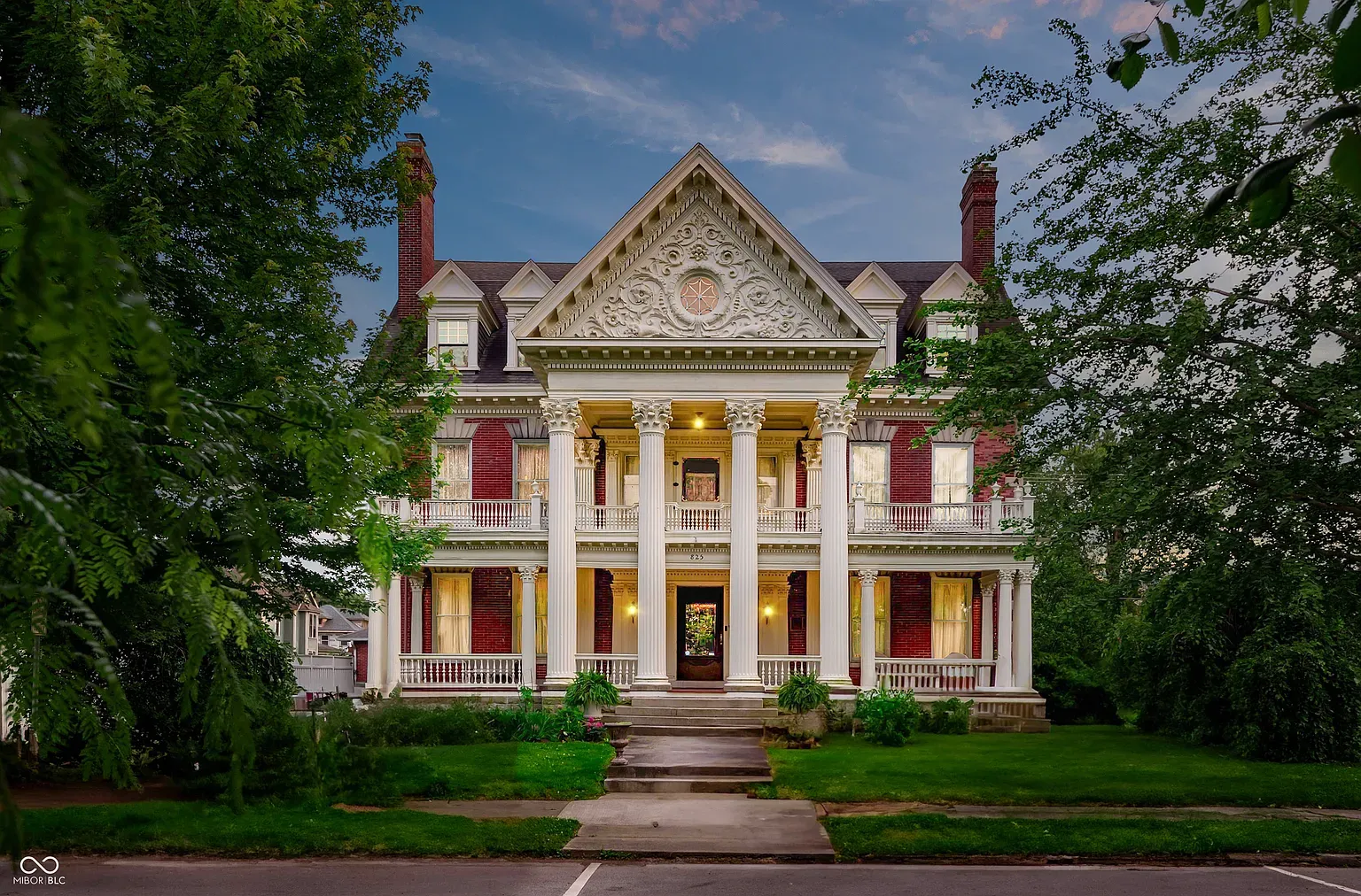 Okay, that gabled roof is doing the most. Brick and white trim pop.