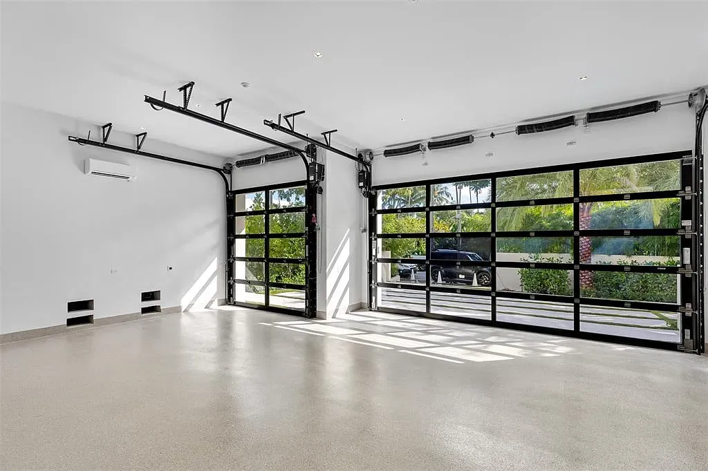 Pristine garage, glossy epoxy floor. I’d eat off it. Not recommended.