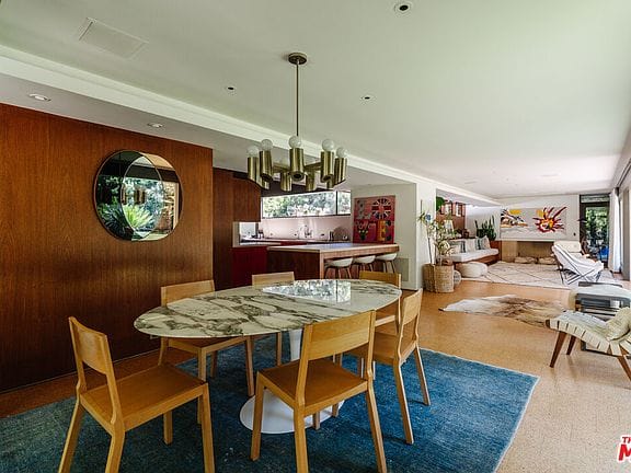 Open space soaking in light. That round table looks perfect for board games.