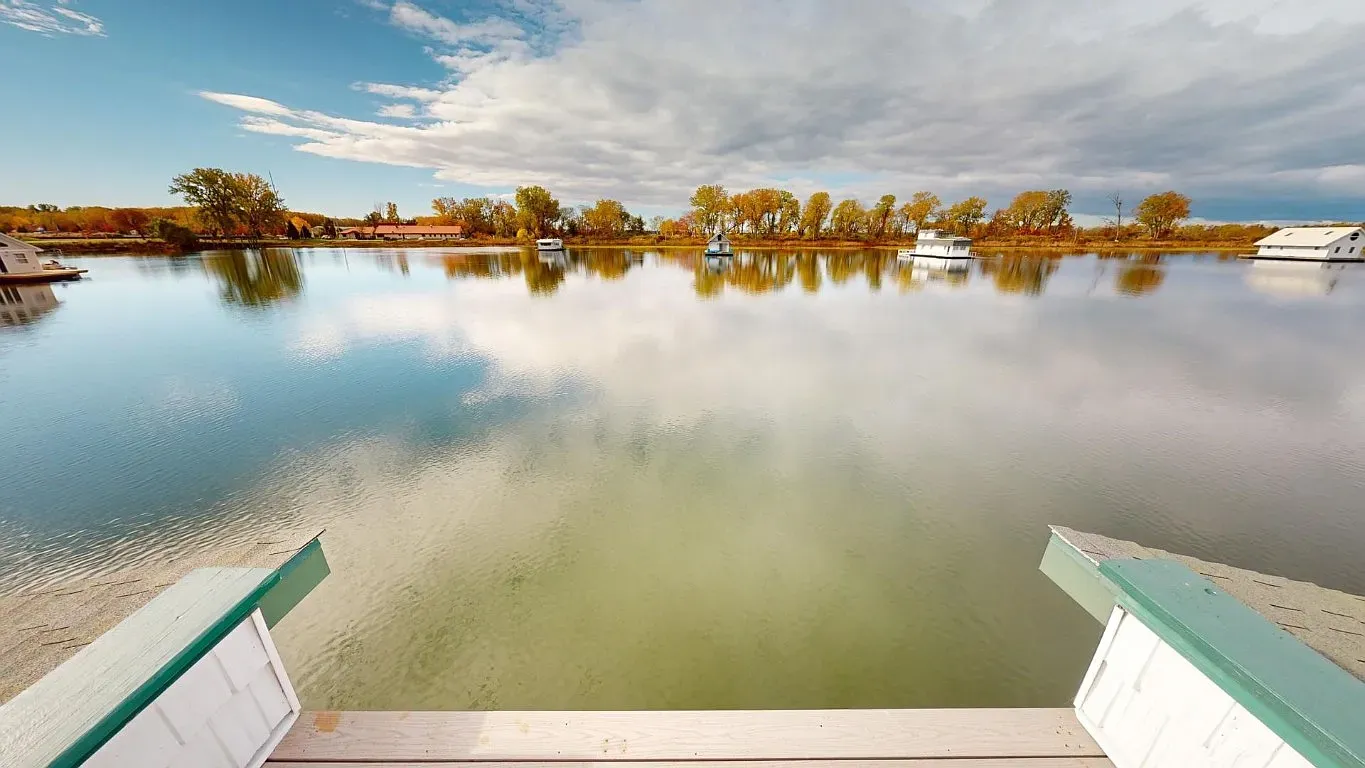 Dock shot. Glassy water and that soft sunset color doing its thing.