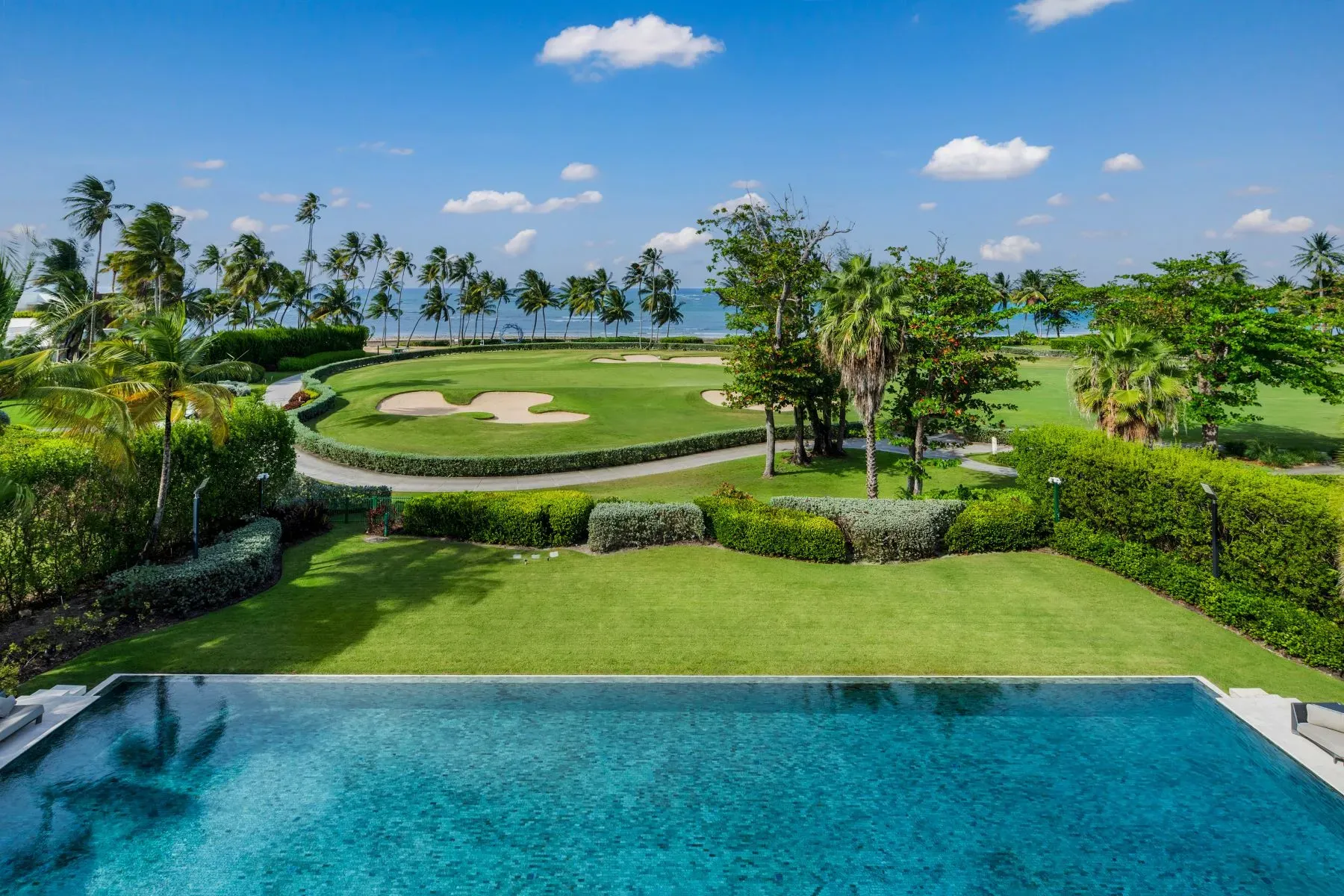 Alternate pool angle. Lush edges, super clean water. Would never leave.