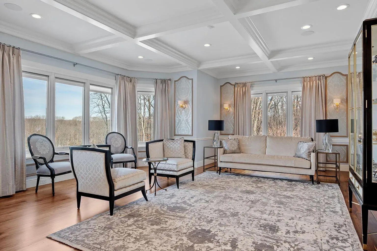 Finally, the living room. soft neutrals, warm wood, just easy to be in.