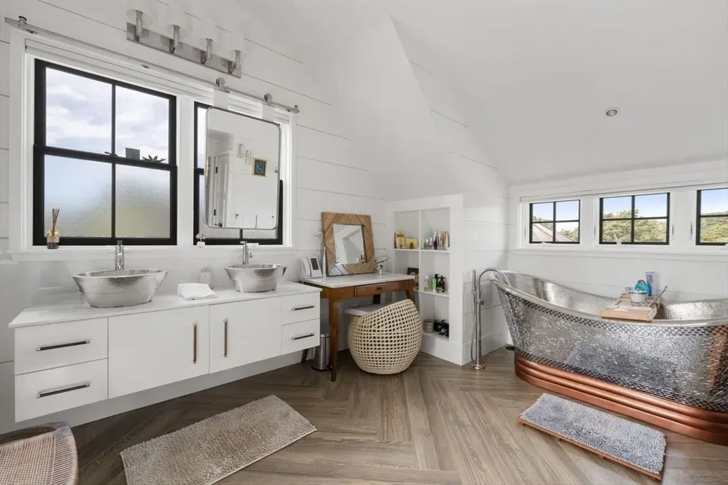 White shiplap with herringbone floors. Clean, a little farmhouse, not sterile.