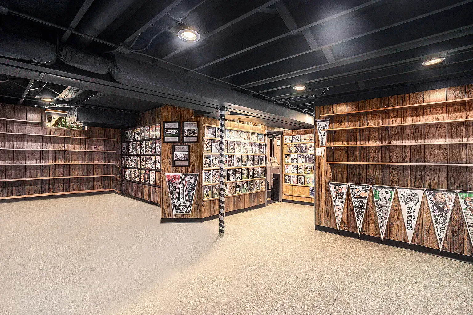 Basement den with vintage wood paneling. Feels ready for records and card games.