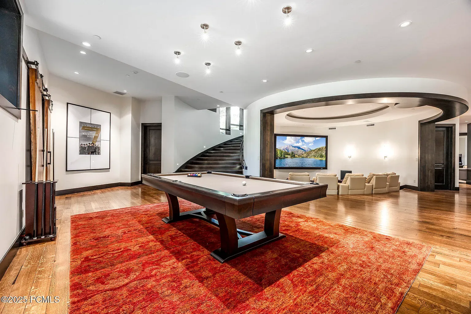 Pool table center stage. Warm floors, plenty of hangout perimeter.