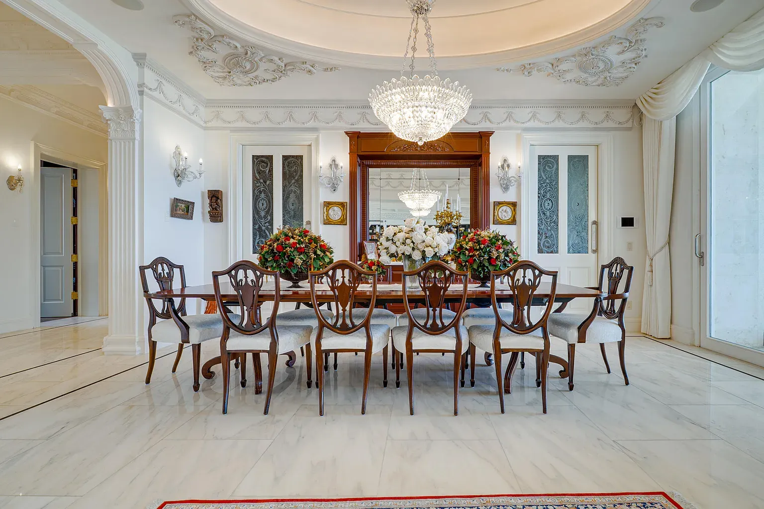 Formal dining—polished marble, big chandelier. Anyone else terrified to spill wine?