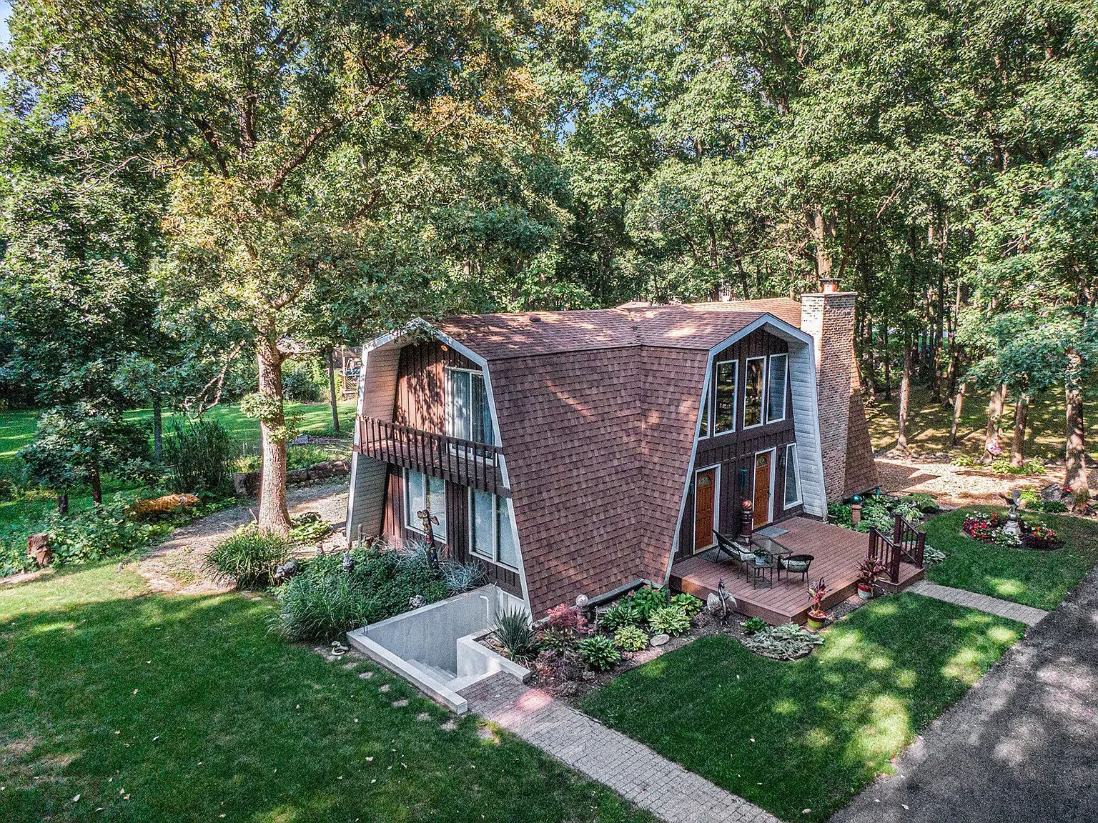 Another angle on the A-frame. Brown shingles, crisp white trim, postcard stuff.