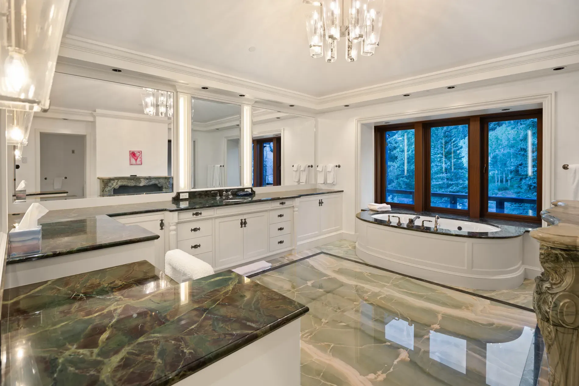 Bathroom marble has green veins—anyone know the stone? Looks expensive.