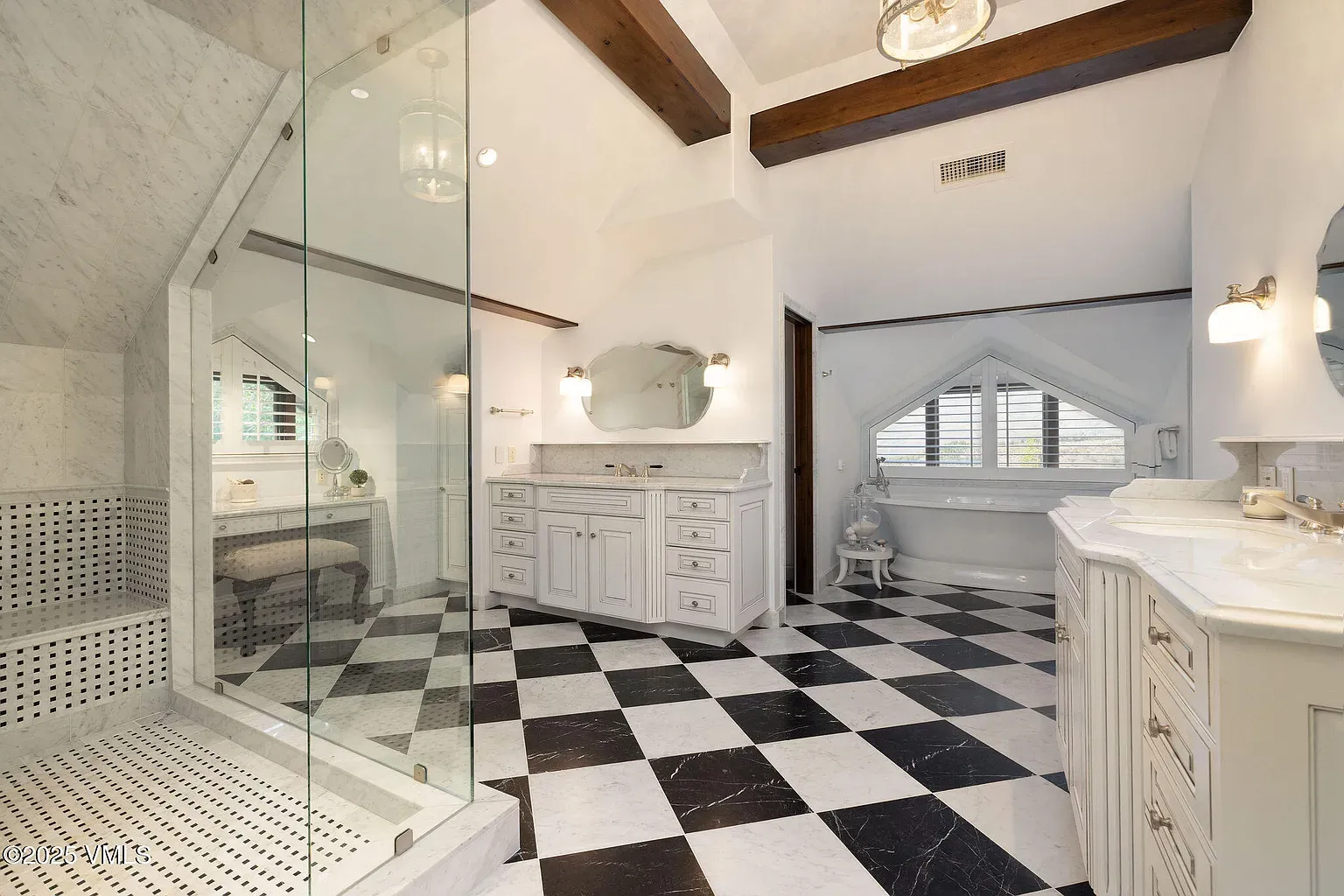 Okay, checkerboard floor! Dramatic, but the light walls keep it soft.