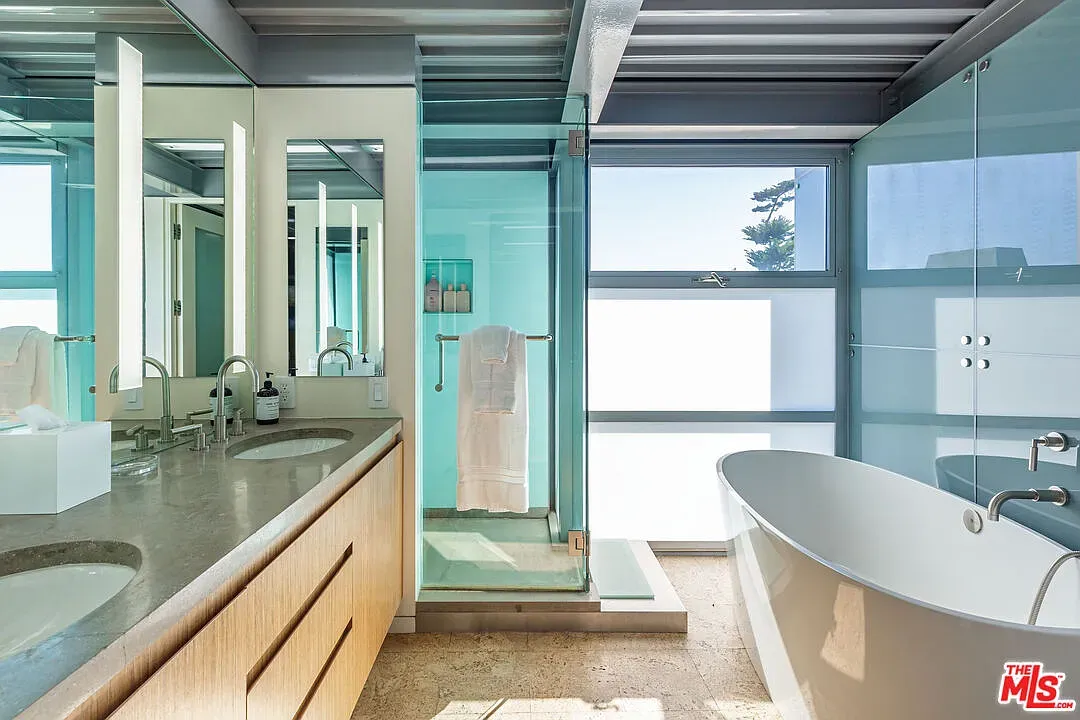 Spa bathroom goes full window wall. Hope the neighbors are far.