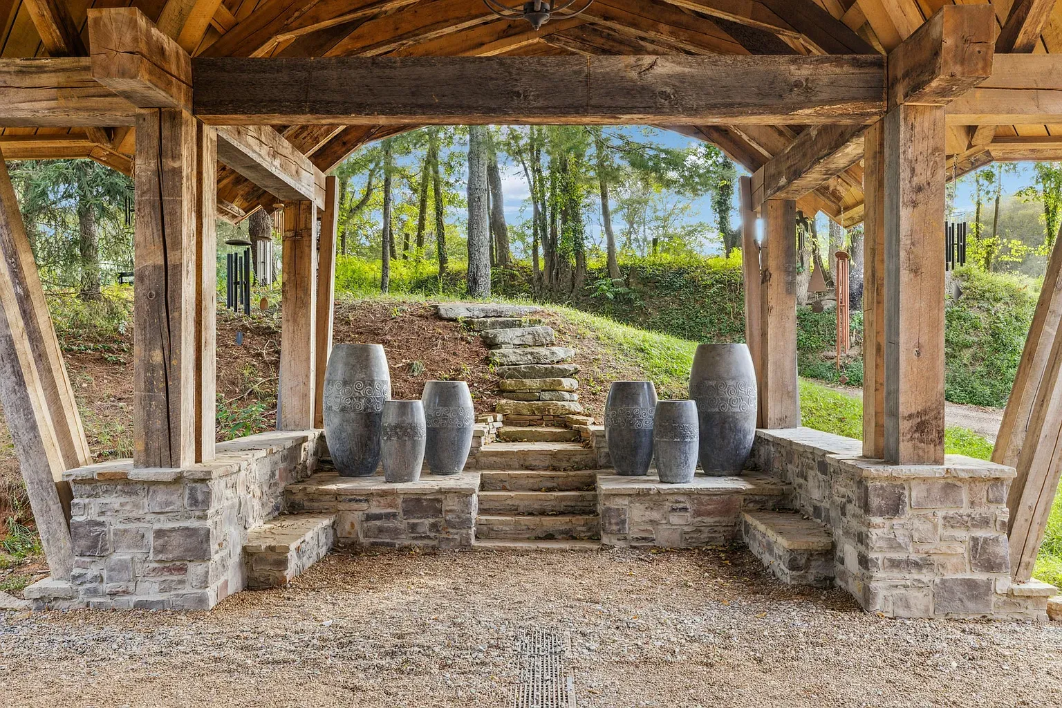 Timber pavilion situation. Big beams, open air, just missing a couple Adirondacks.