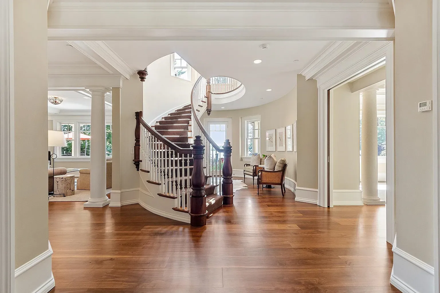 Entry flex. that spiral staircase steals the show.