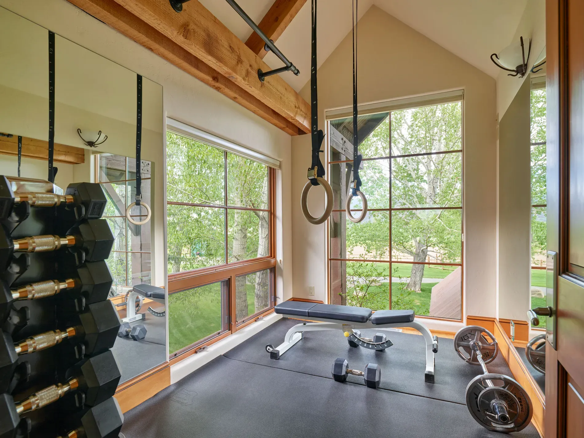 Home gym time. rubber floor, bench, big mirror. From this angle, motivating?