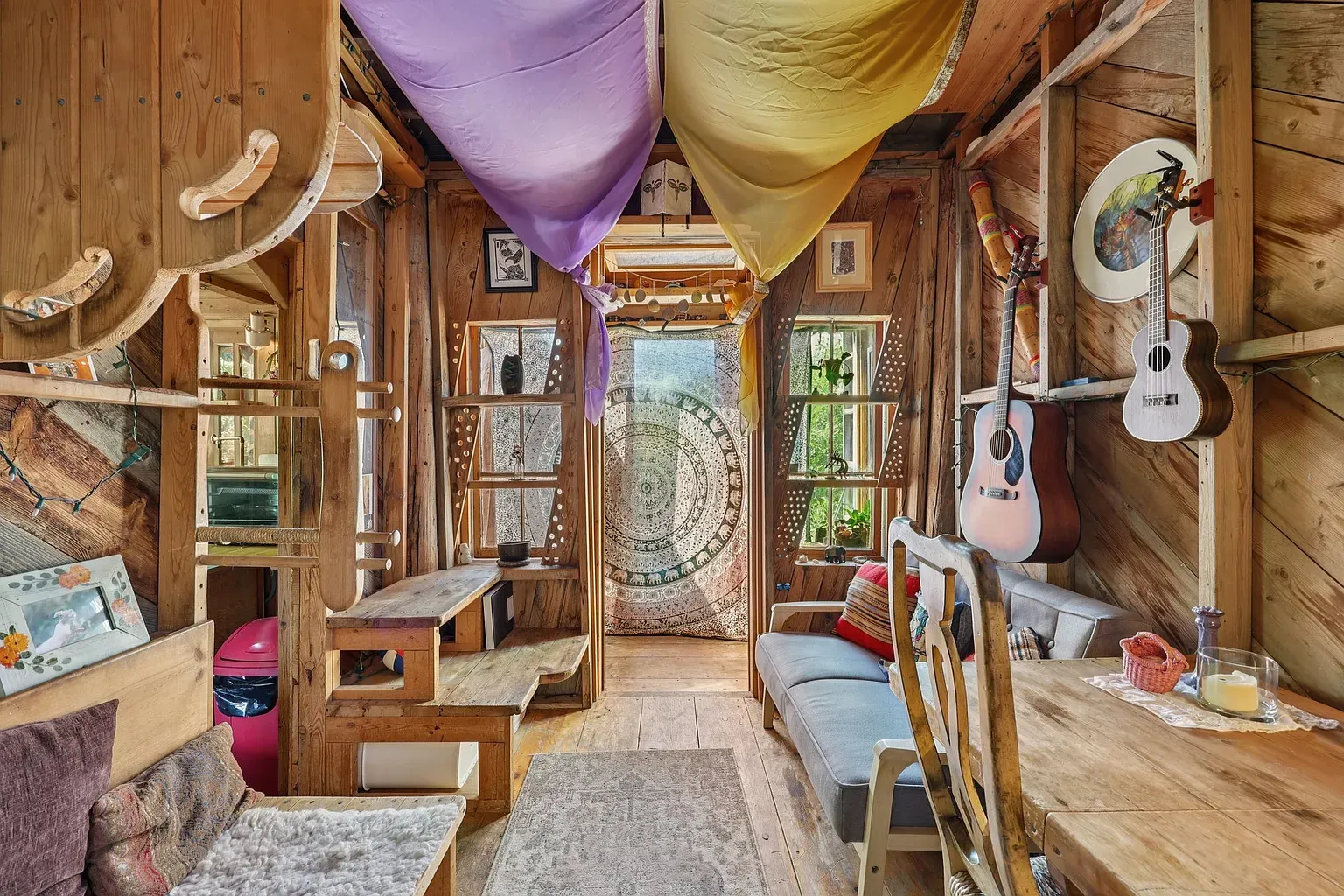 Artsy wood plank room. Handmade feel, a studio you accidentally live in.