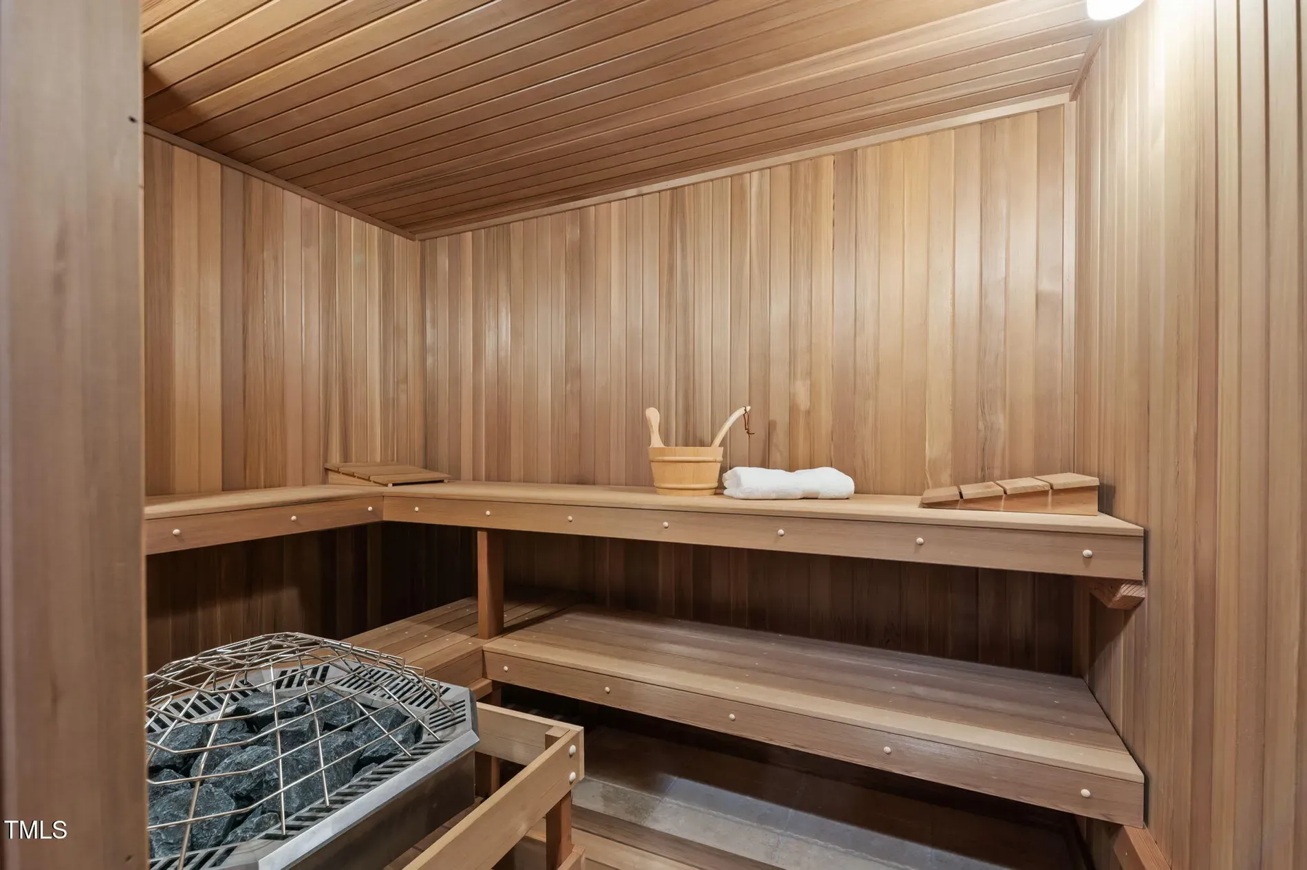 Back to zen—honey wood sauna, soft lights. Slow roast time.