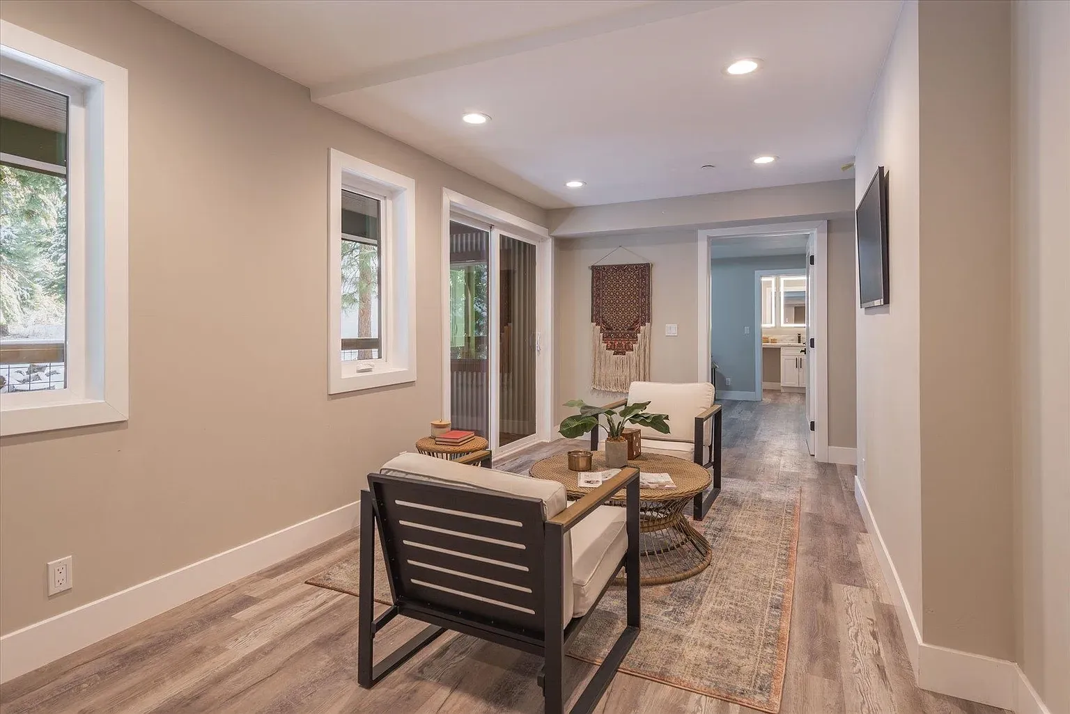 Recessed lights doing work. Soft gray and taupe keep it relaxed.