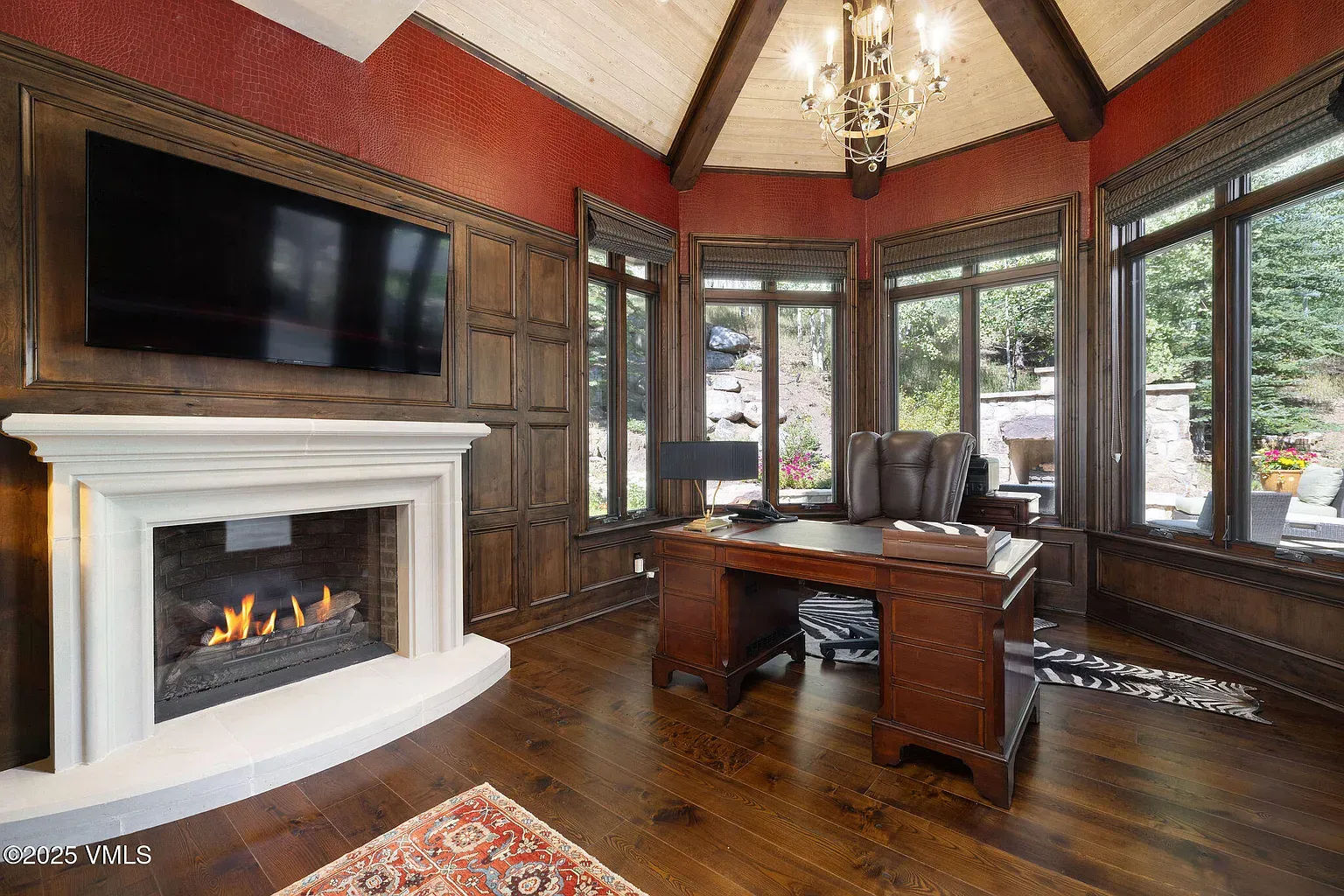Office vibes. dark wood, vaulted ceiling, exposed beams. Rich without feeling gloomy.