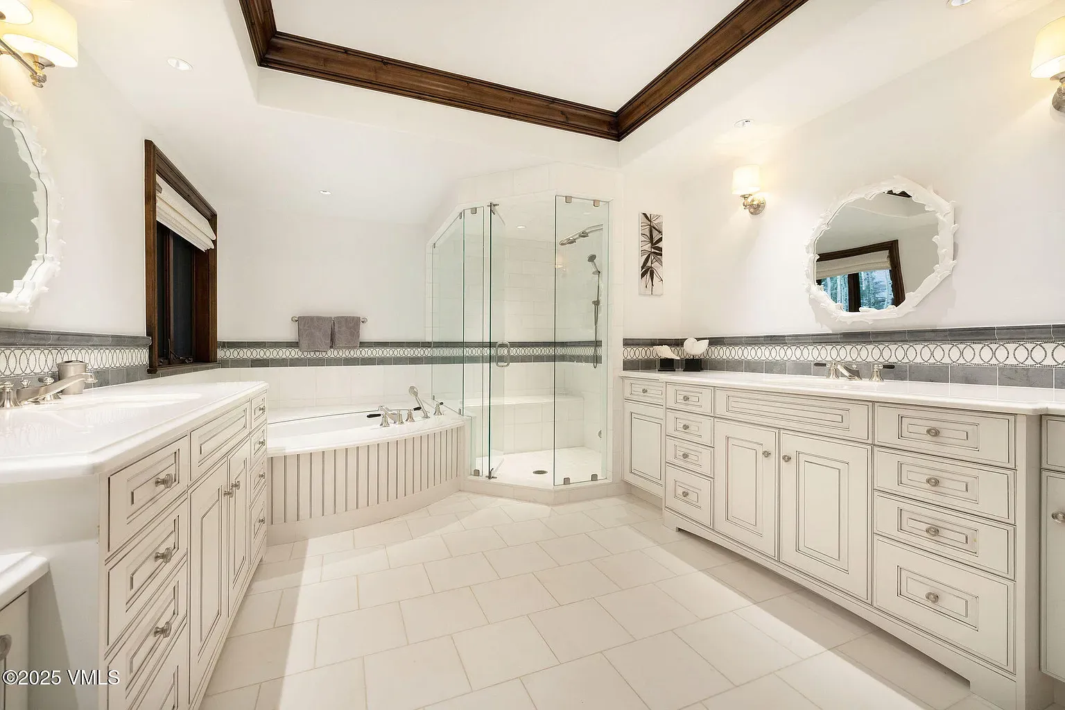 Another bath. creamy whites, polished marble floor. Fresh without feeling sterile.