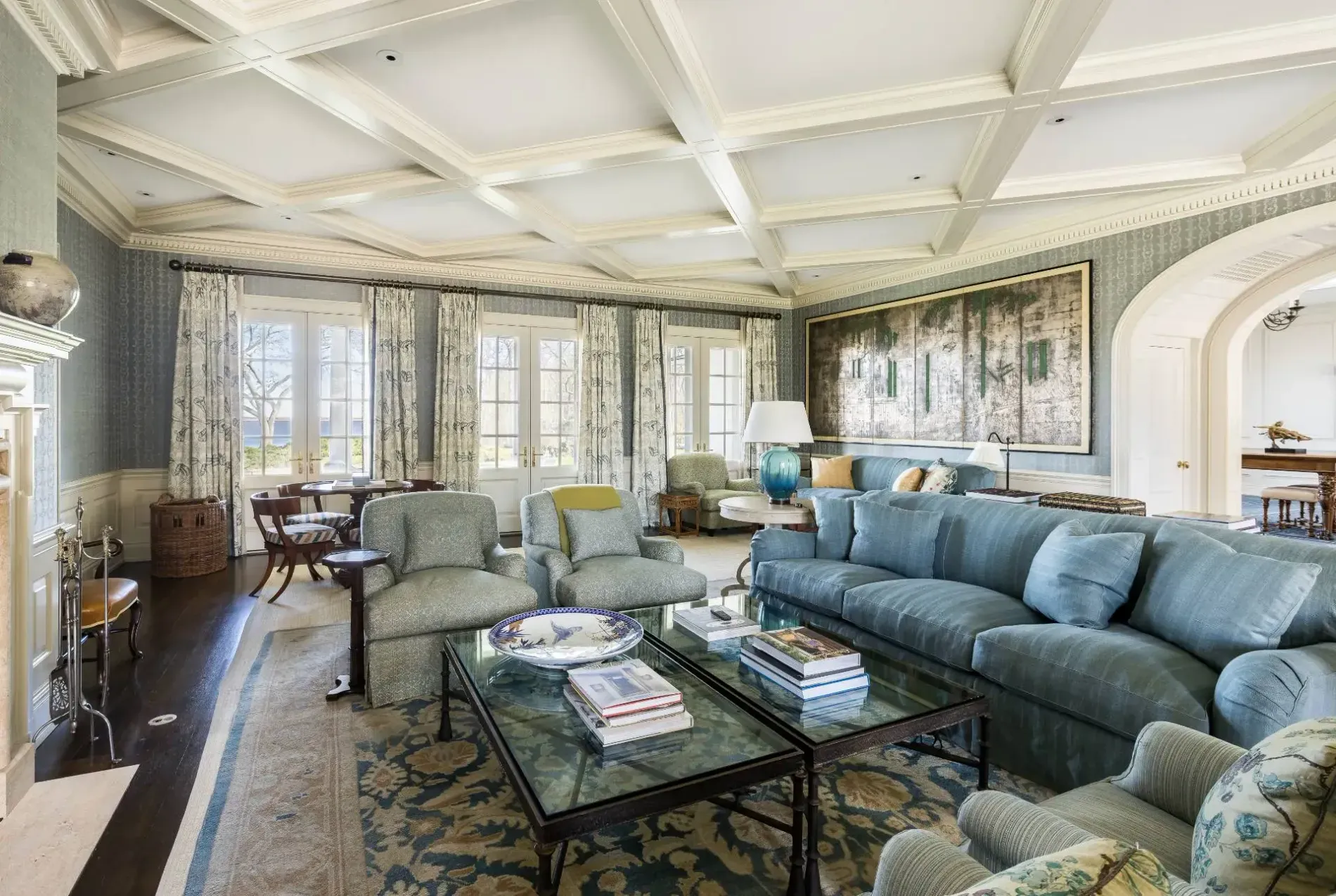 Living room in sage and beige. Coffered ceiling is crisp, not too fussy.
