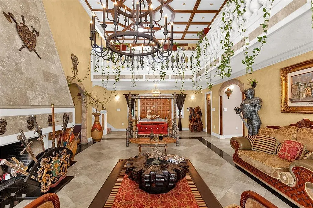 Grand foyer flex. high coffered ceiling, ochre walls, marble floor pattern marching forever.