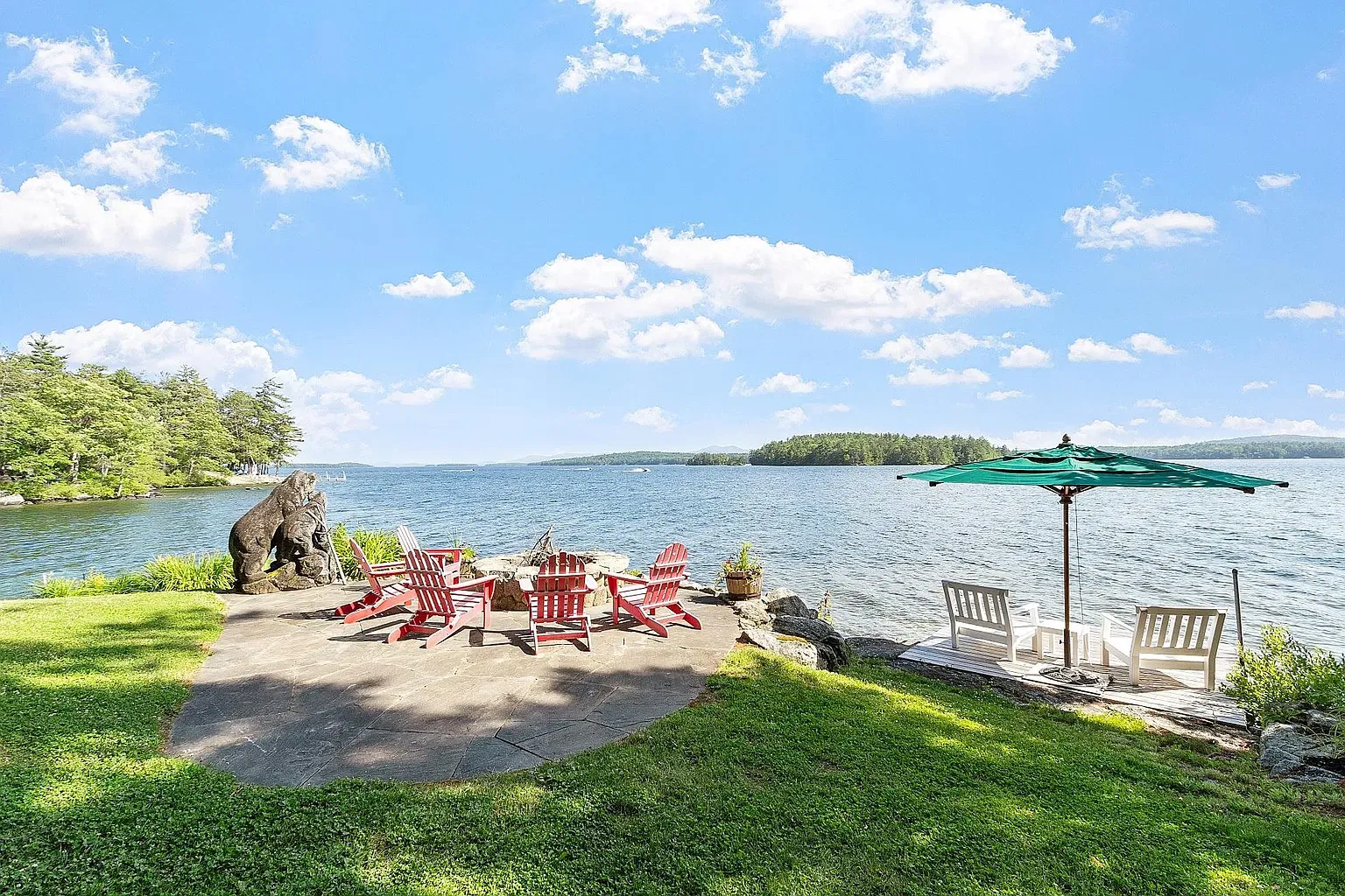 Red Adirondacks in a circle a campfire without the smoke.