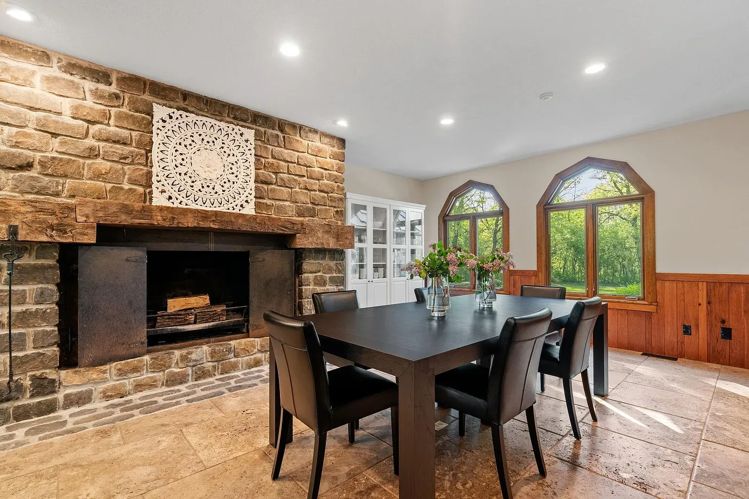 Stone fireplace as the star. that artwork above actually works.