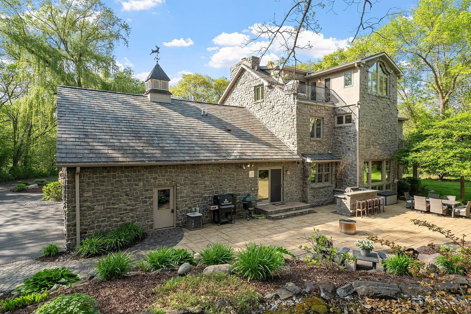 Full exterior again - slate roof looks pricey, but wow.