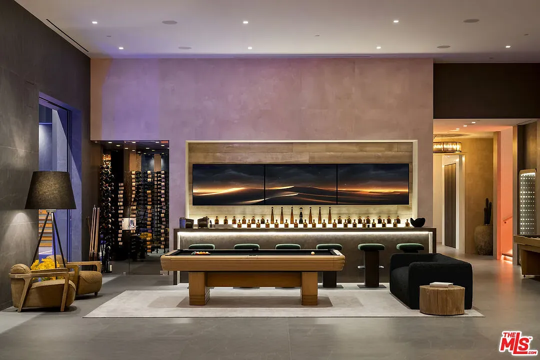 Lounge area with warm browns and taupe, feels calm but fancy.