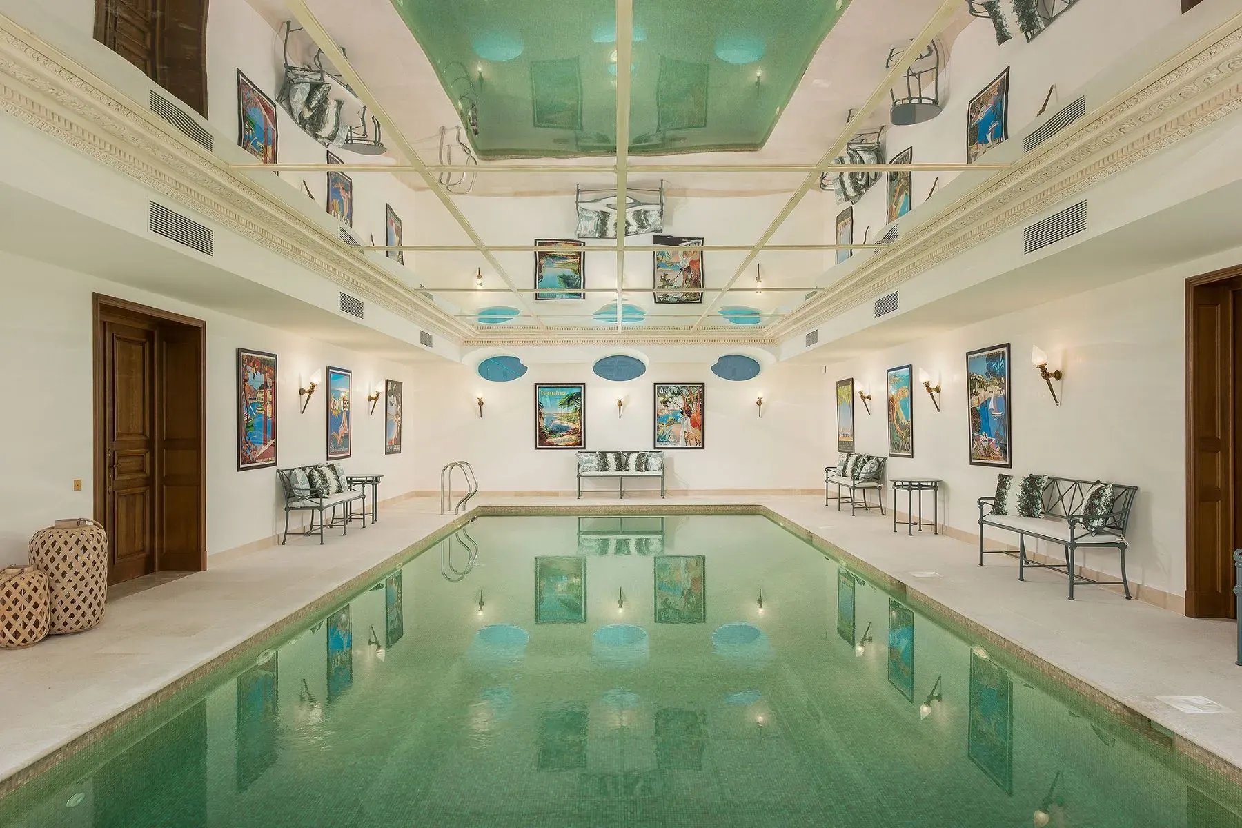 Surprise indoor pool with emerald water. Echo-y in the best way.