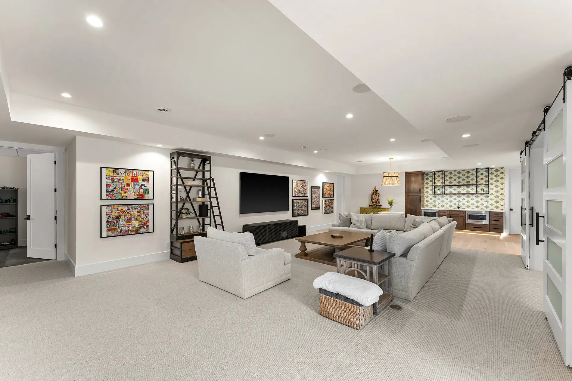 Big basement vibe—soft whites, taupes, ready for movie night or ping-pong.