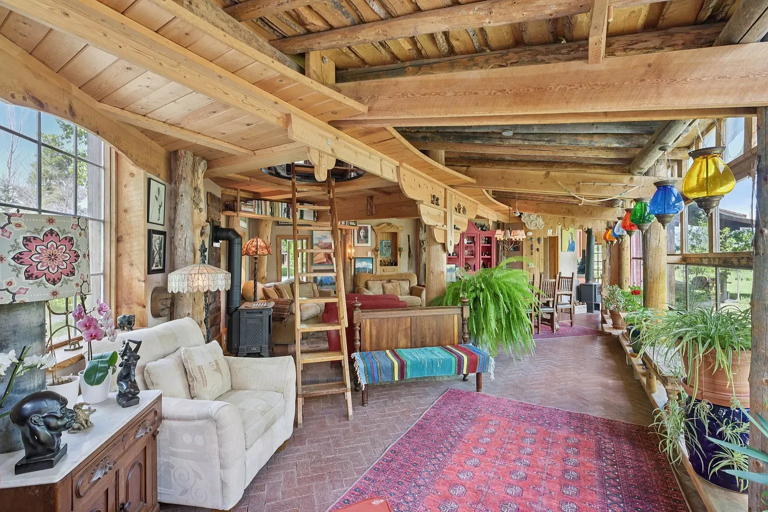 Another cozy corner with beams and greenery views. Eclectic but calm.
