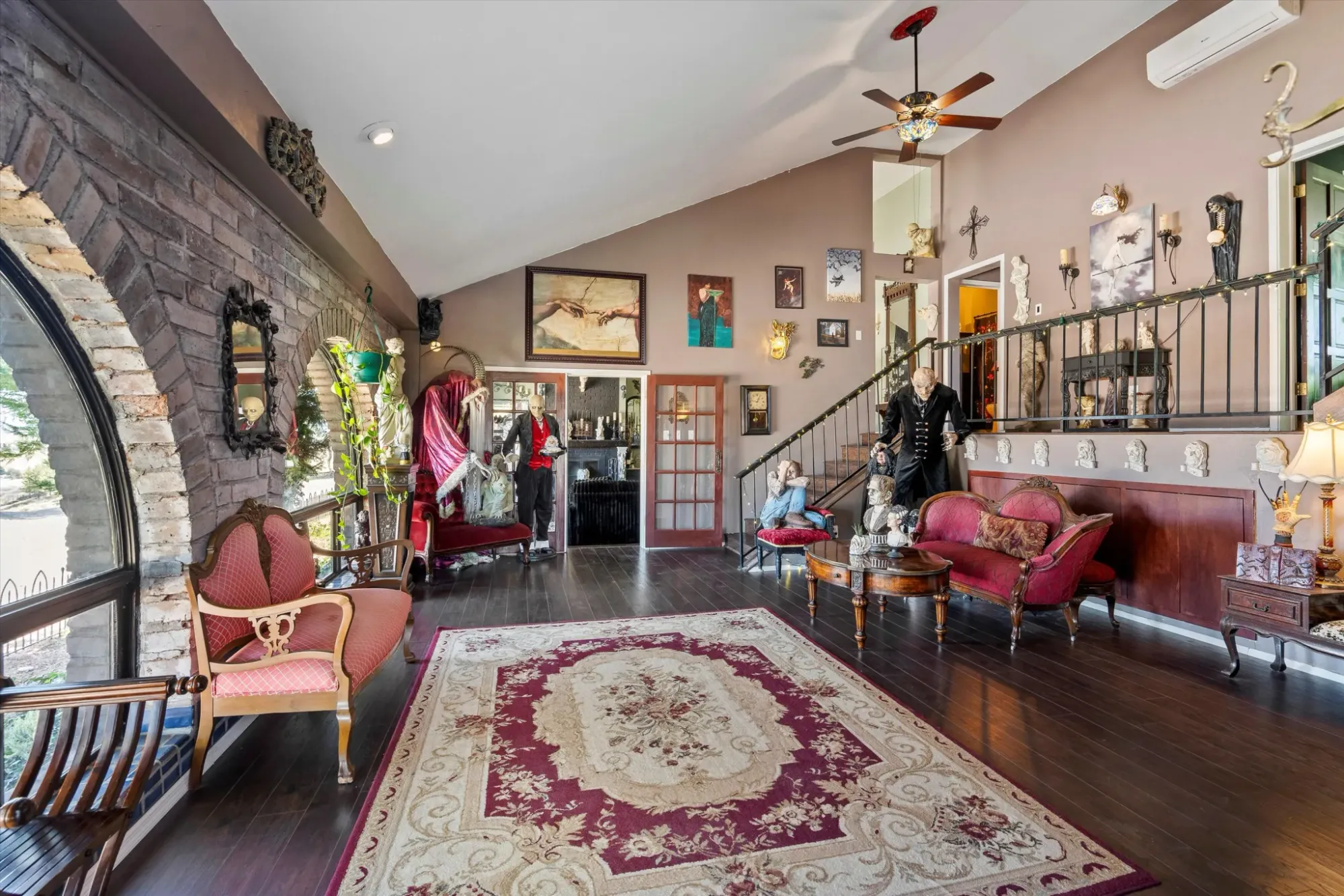 High ceilings, warm tones, lots of collected stuff. Feels a creative hangout.