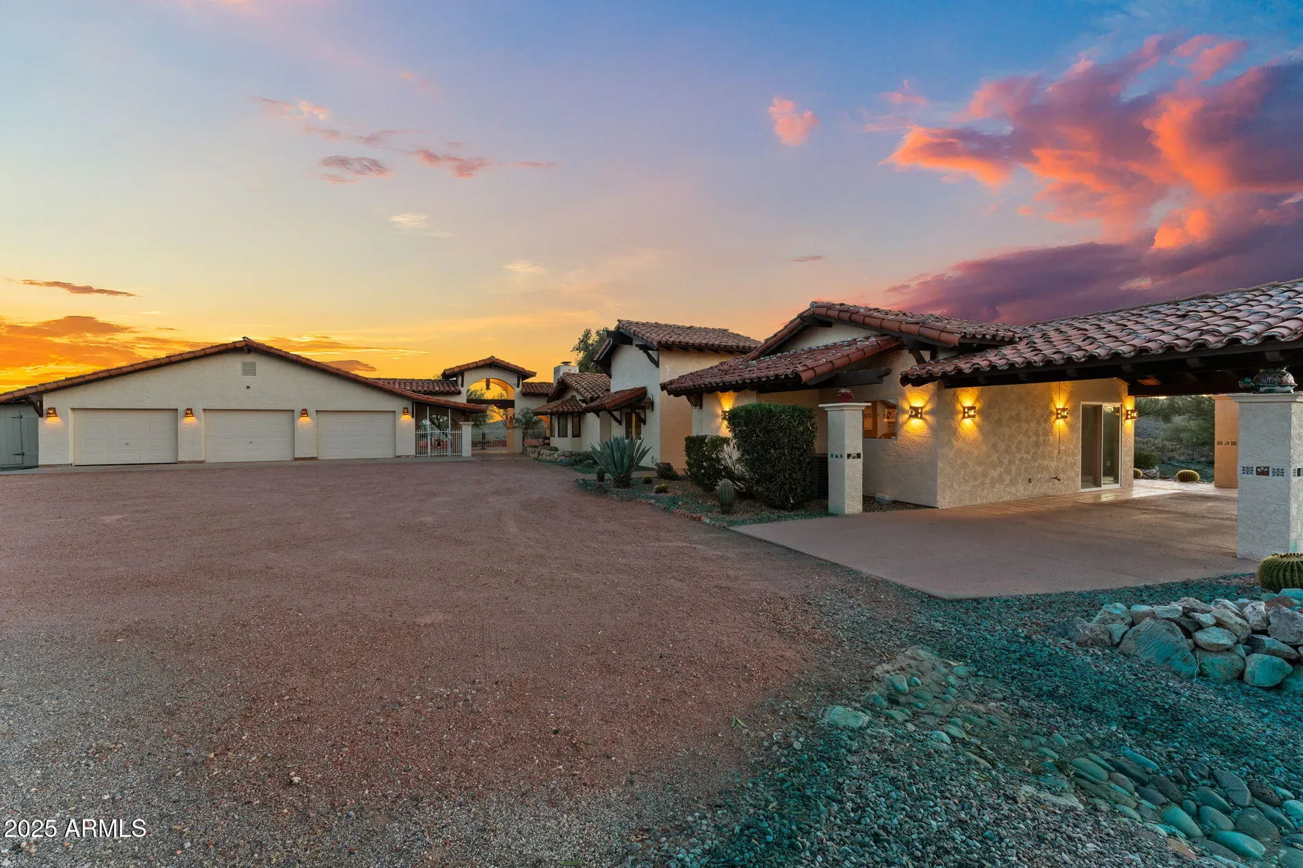 Big adobe estate moment. Roof tiles everywhere, blends into the desert.